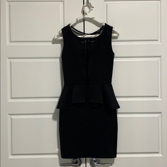 Guess Dresses & Skirts - Guess black minidress!! Very elegant 💋